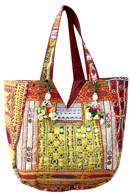 Luxury tribal handmade handbags with full decoration of tribal pieces